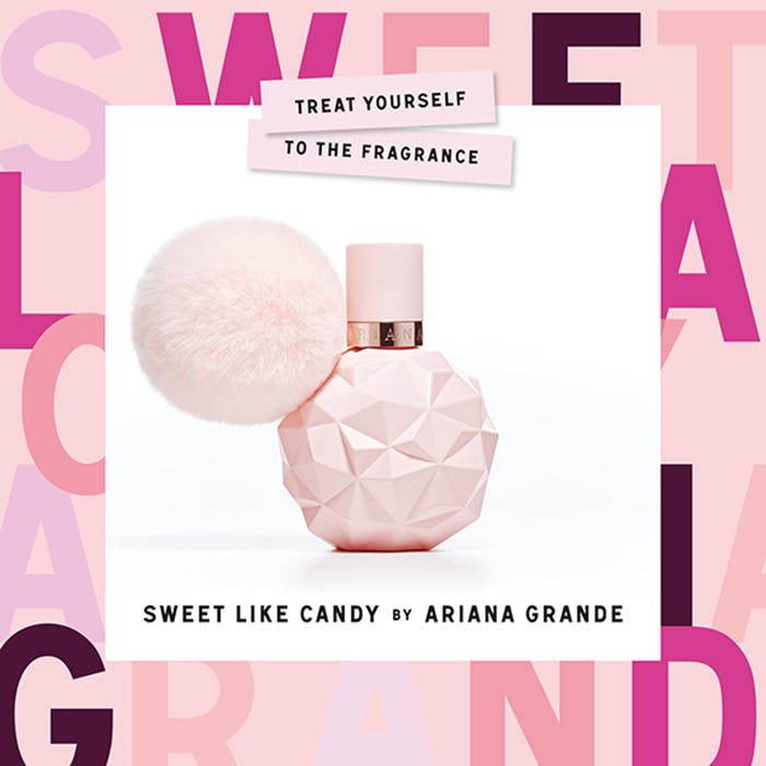 Pink perfume bottle with geometric design on a white background, surrounded by large pink letters.