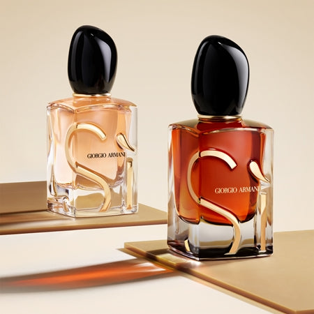 Two Giorgio Aperfume bottles on a beige background
