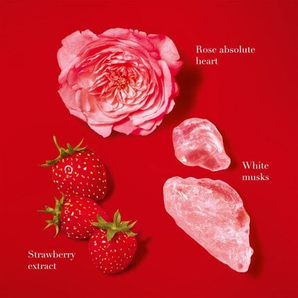Rose absolute heart, strawberry extract, and white musks on a red background