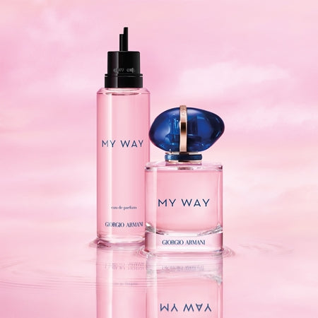 Two Giorgio 'My Way' perfume bottles on a pink background