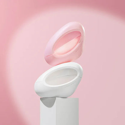 White electronic device with a pink cover on a pink background