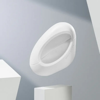 White, oval-shaped object on a gray background