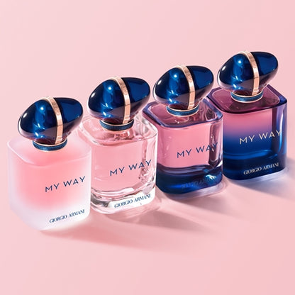 Four bottles of Gior 'My Way' perfume on a pink background