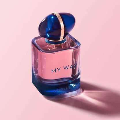 Perfume bottle labeled 'My Way' on a pink background