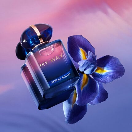 Perfume bottle labeled 'My Way' with a blue flower on a gradient background