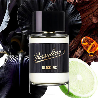  Iris perfume bottle with floral and fruit elements on a dark background