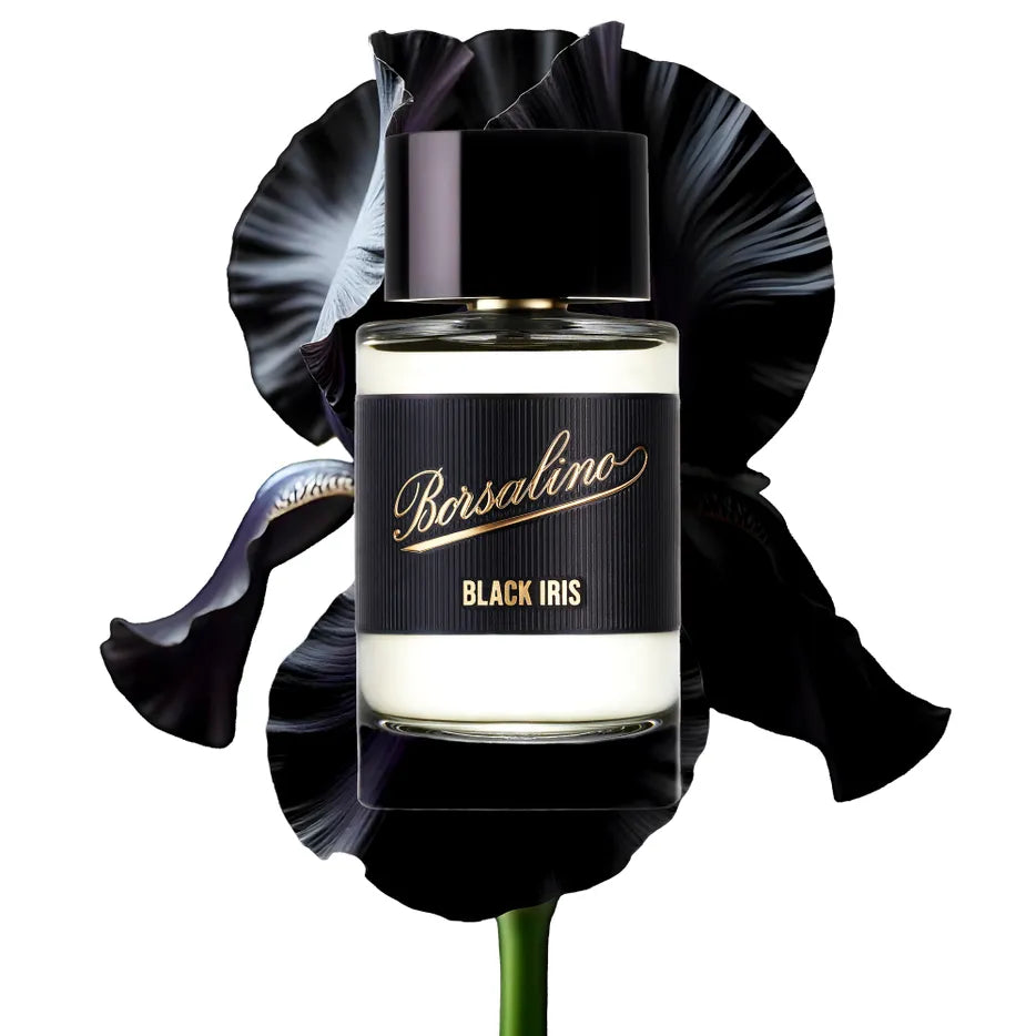 Iris perfume bottle with black iris flower on a white background