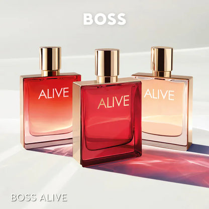 Three BOSS Alive perfume bottles on a white background