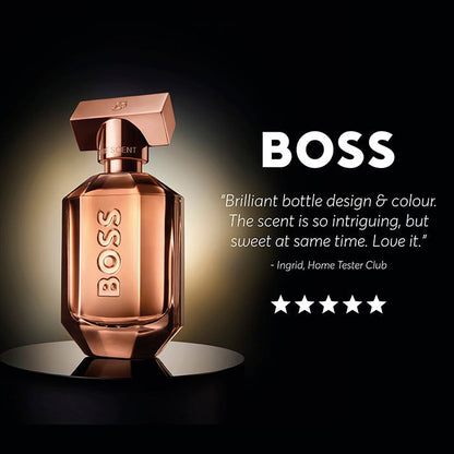 BOSS perfume bottle with a glowing effect on a dark background