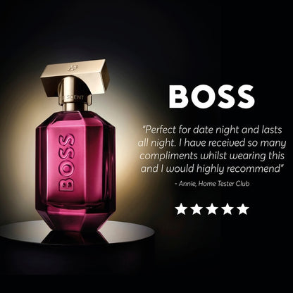 BOSS perfume bottle with a five-star rating and review on a dark background